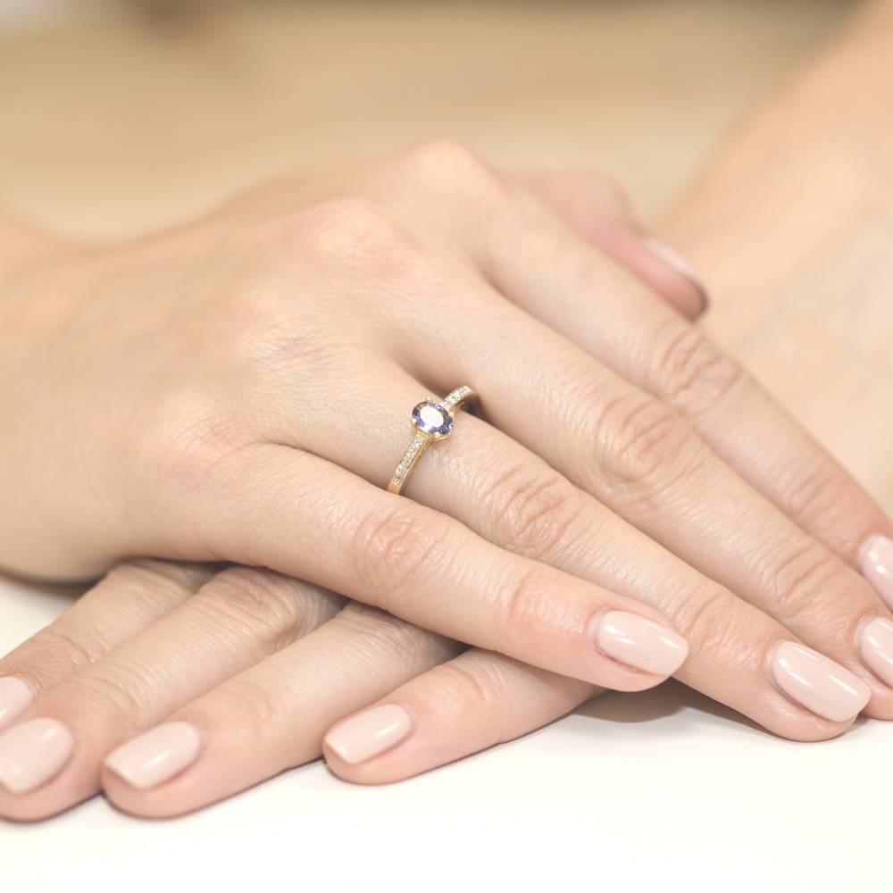 Anello Aurora  in Oro con Tanzanite e 10 Diamanti