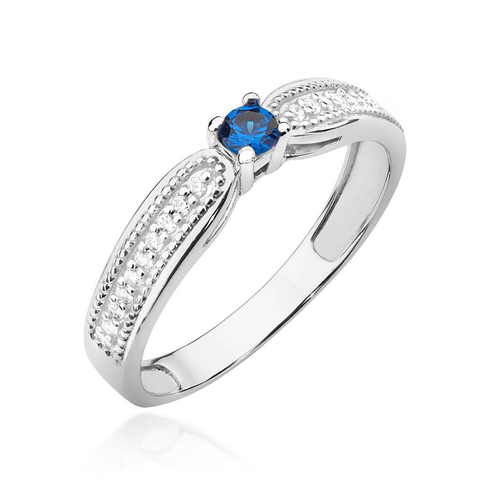 Anillo de Oro con Zafiro 0,15 ct y 18 Diamantes 0,09 ct