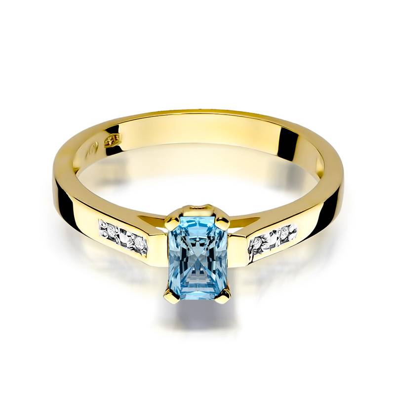 Anillo en oro macizo con topacio 0,80 ct y 4 diamantes 0,04 ct