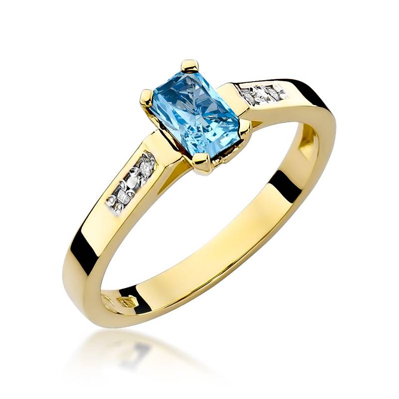 Anillo en oro macizo con topacio 0,80 ct y 4 diamantes 0,04 ct