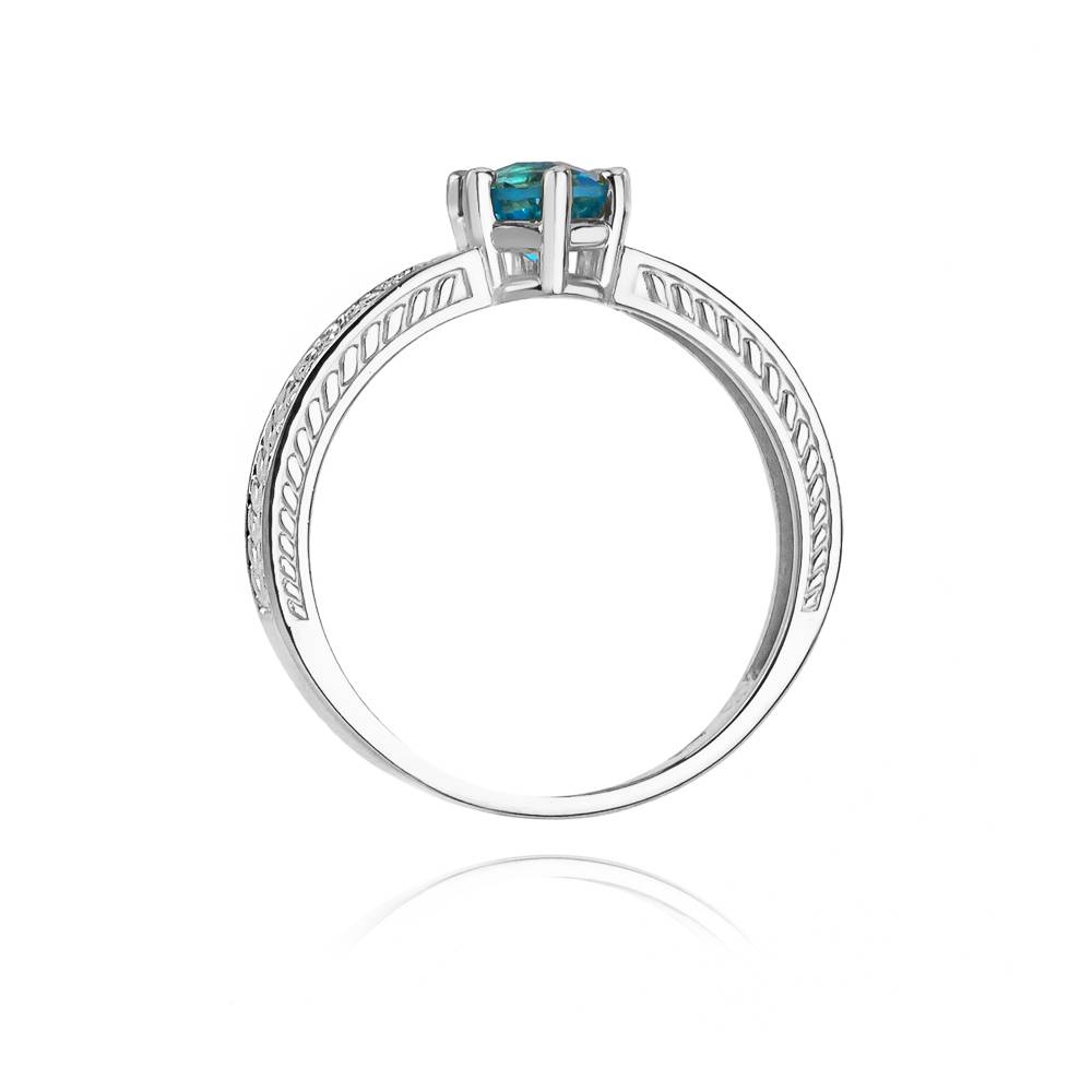 Anello In Oro con Topazio 0,50 ct e 16 Diamanti 0,08 ct