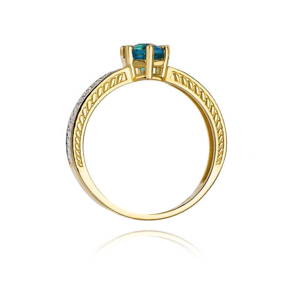 Anello In Oro con Topazio 0,50 ct e 16 Diamanti 0,08 ct