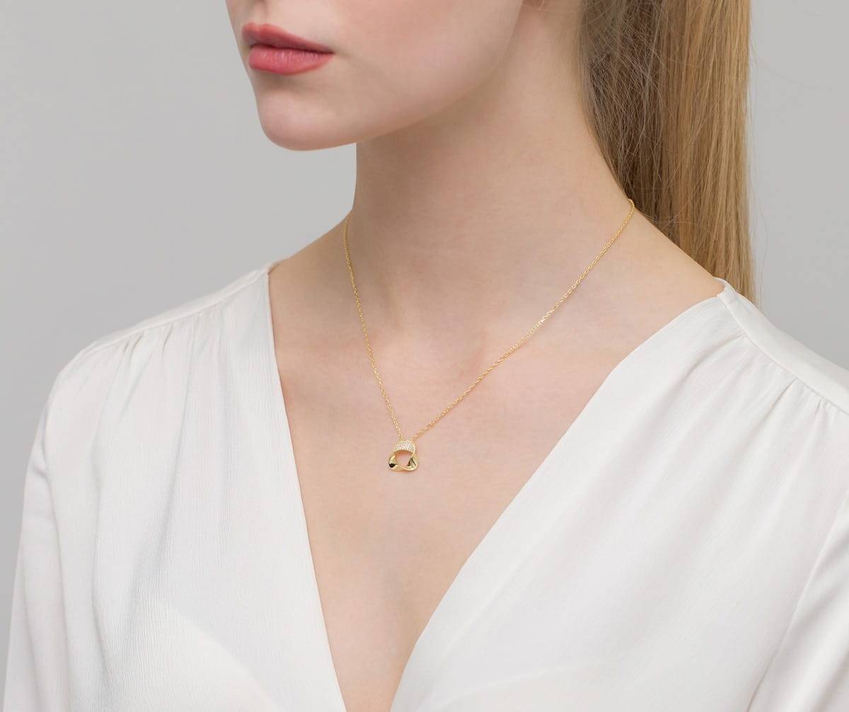 Goldene Ribbon-Halskette mit Zirkonia
