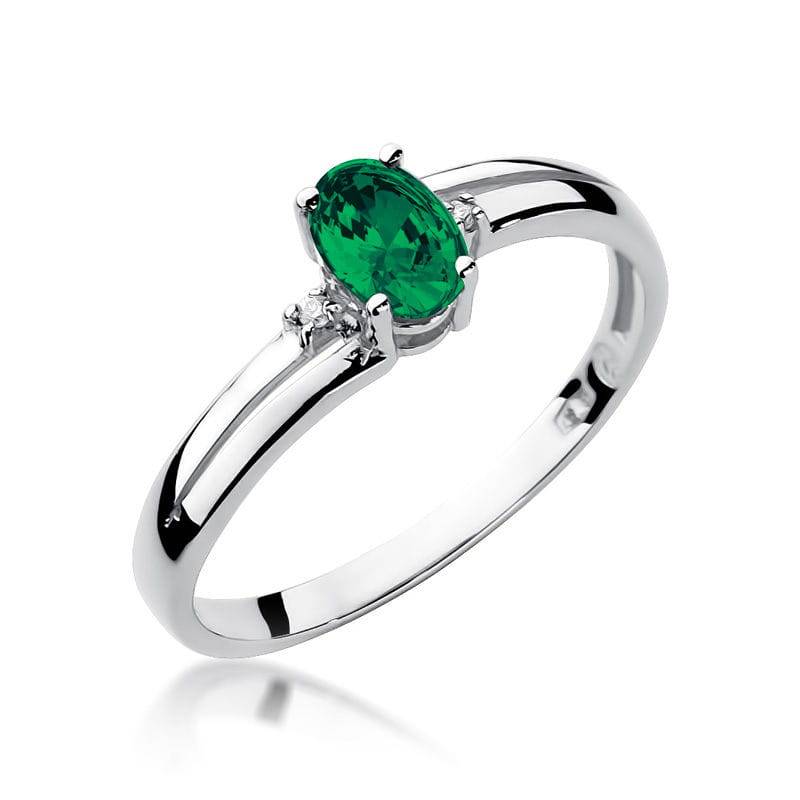 Ring aus Gold mit Smaragd 0,40 ct und 2 Diamanten 0,03 ct