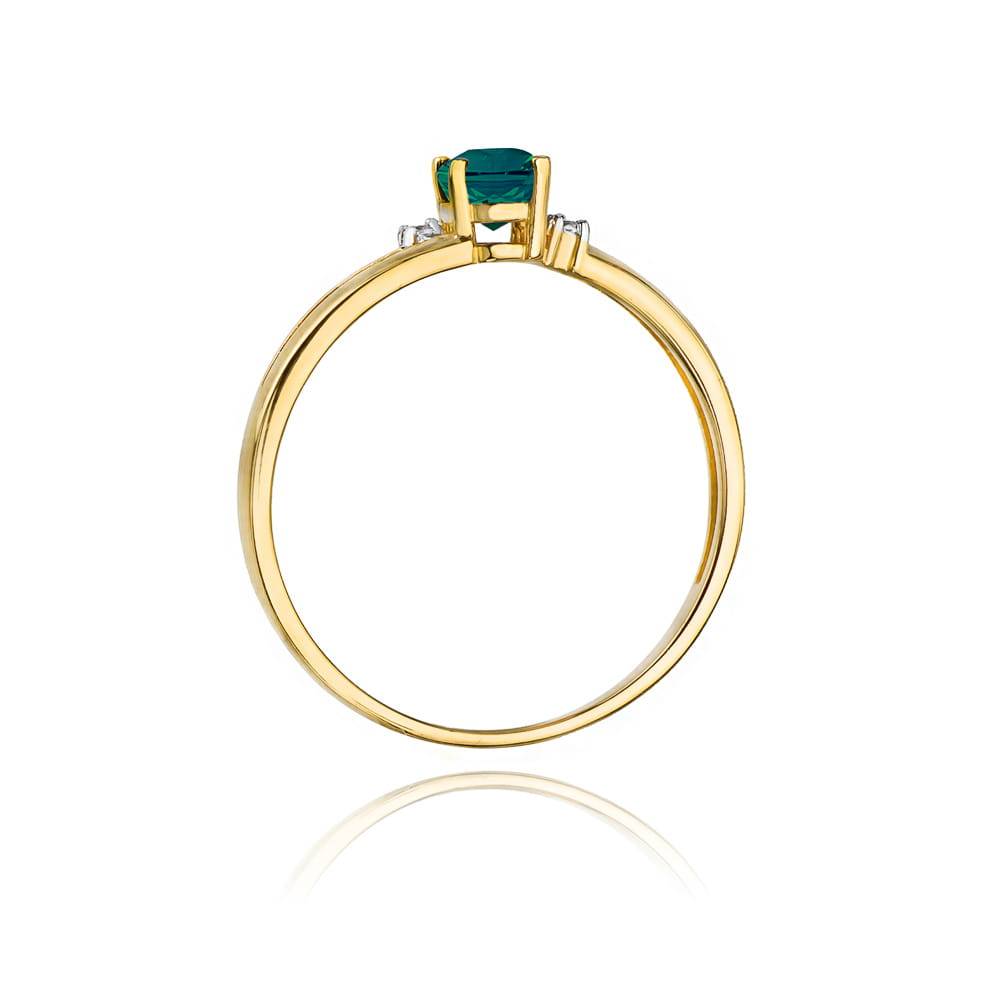 Ring aus Gold mit Smaragd 0,40 ct und 2 Diamanten 0,03 ct