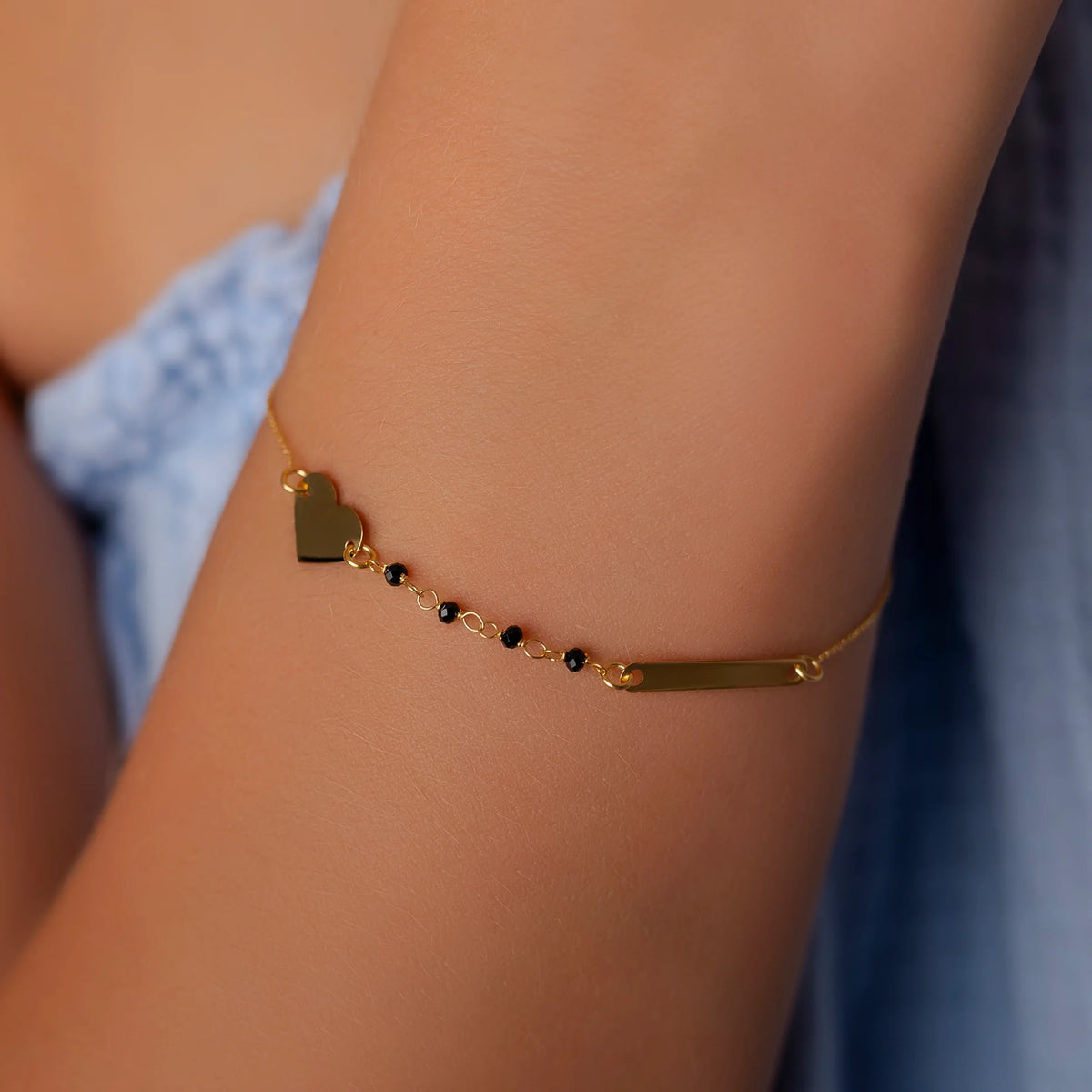 Damenarmband aus Gold mit Herz, Plakette und Zirkonia