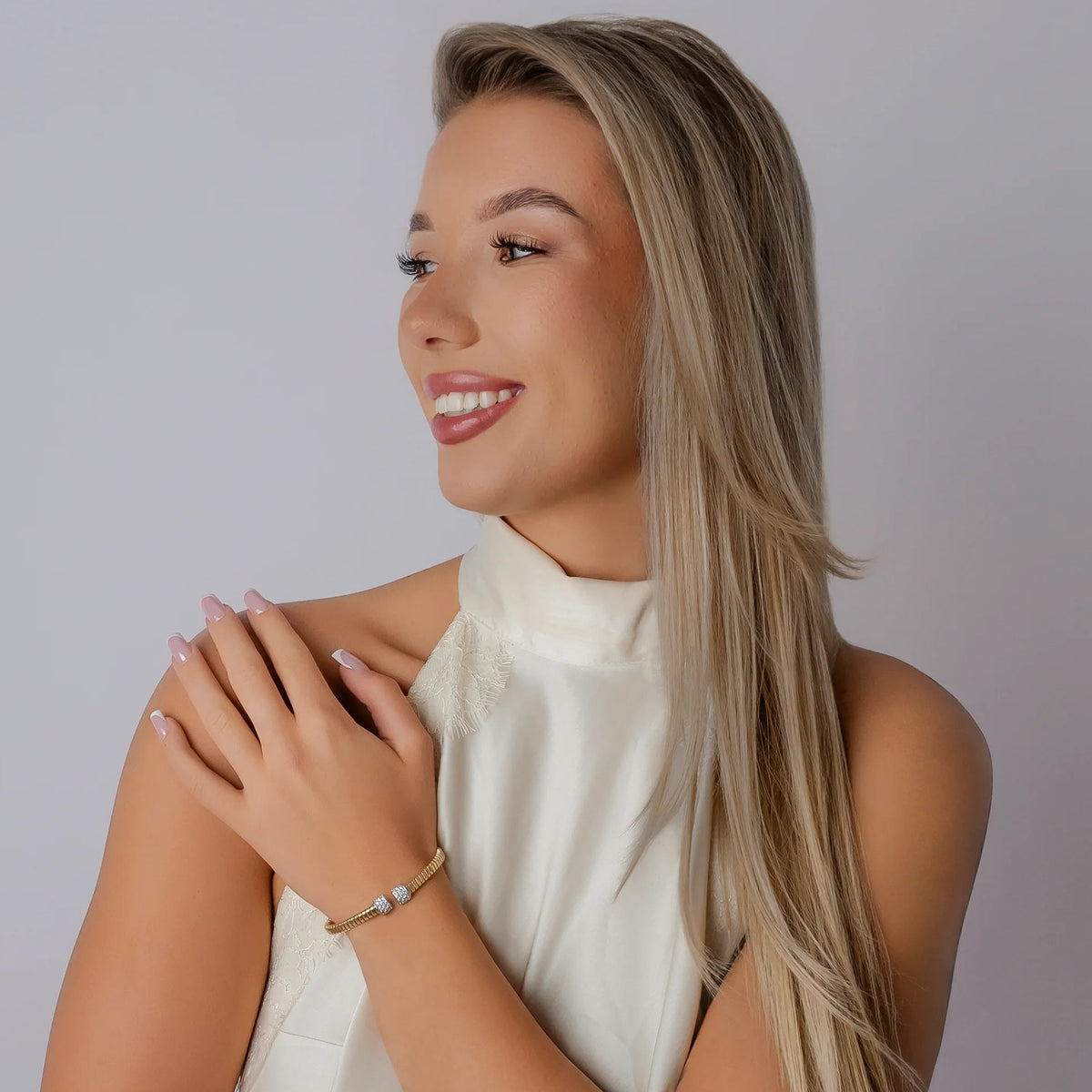 Bracciale rigido in Argento Dorato con Zirconi