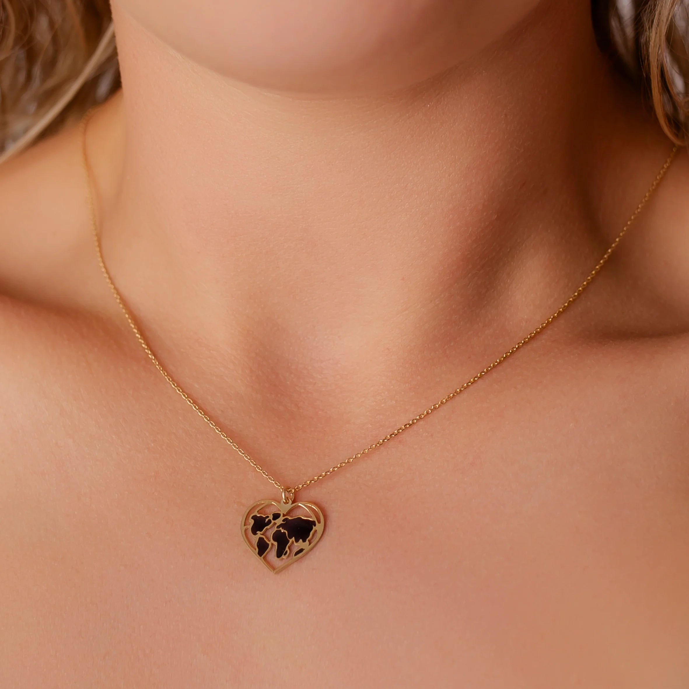 Necklace with Continents inside Heart