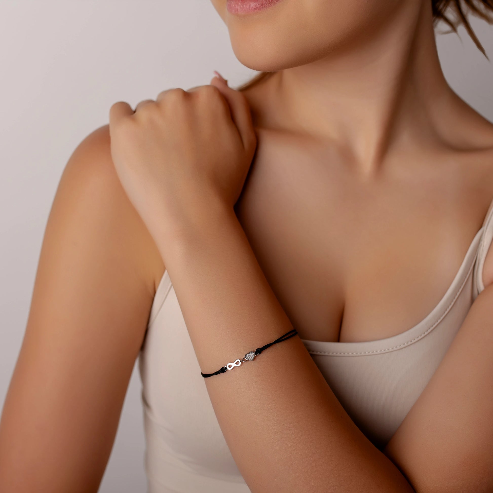 Armband aus Silber mit Kordel Herz und Unendlich rhodiniert