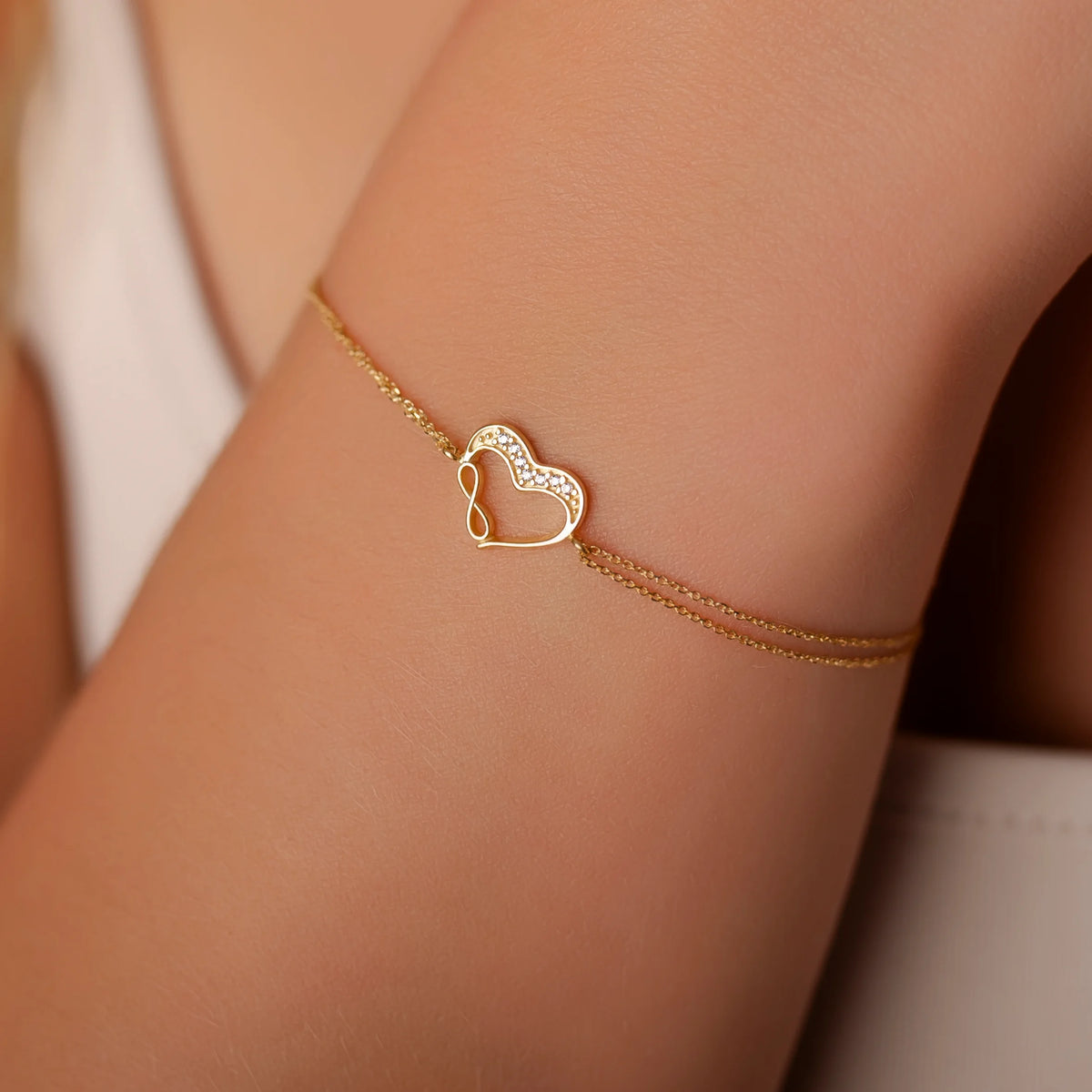 Bracciale in Oro Due Fili e Cuore Infinito Strass