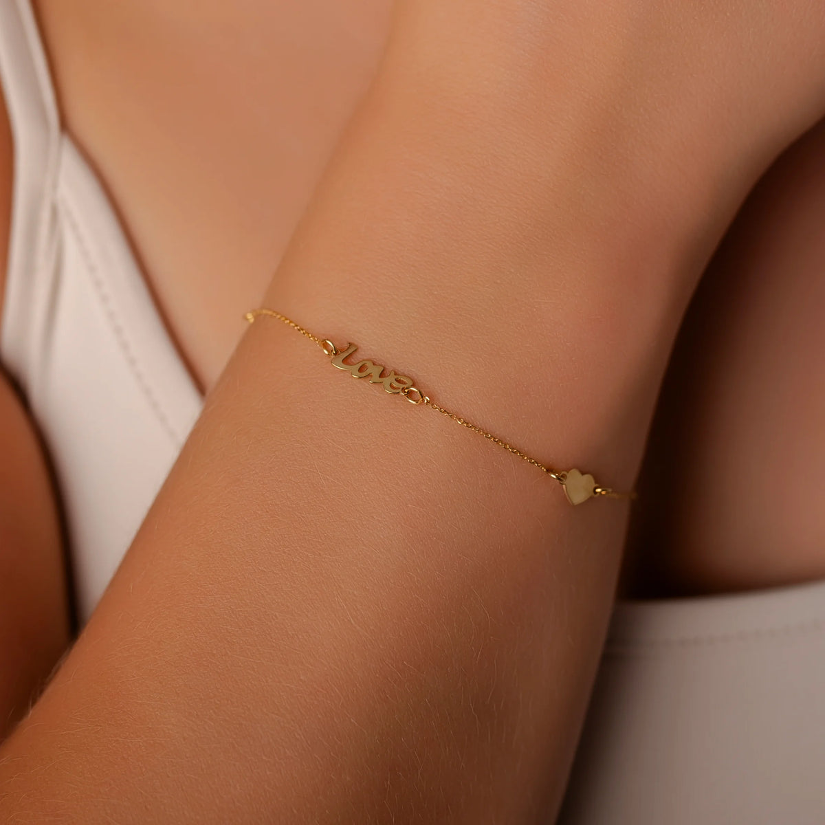 Goldarmband Love mit drei Herzen