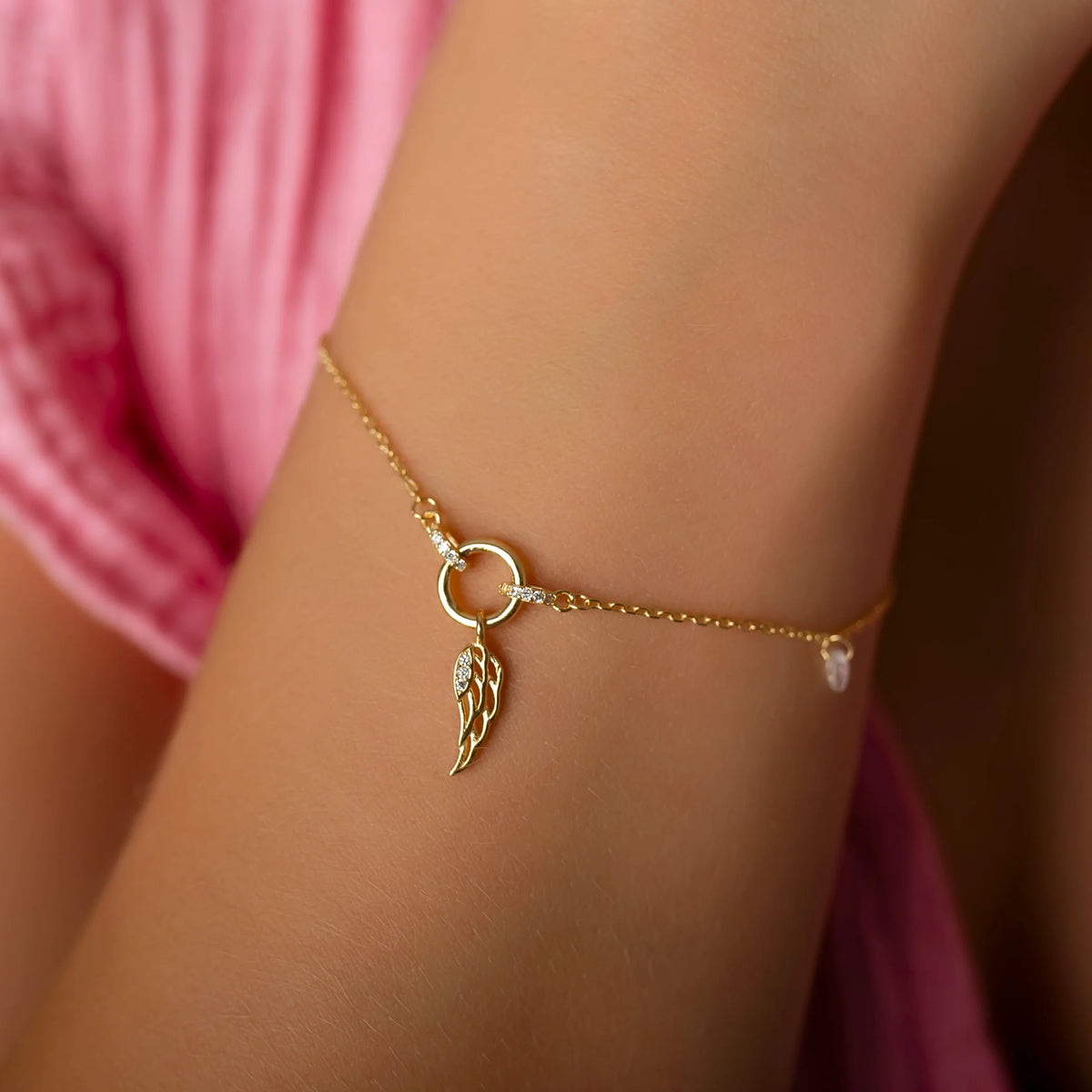Bracciale Argento con Ala e Punto Luce