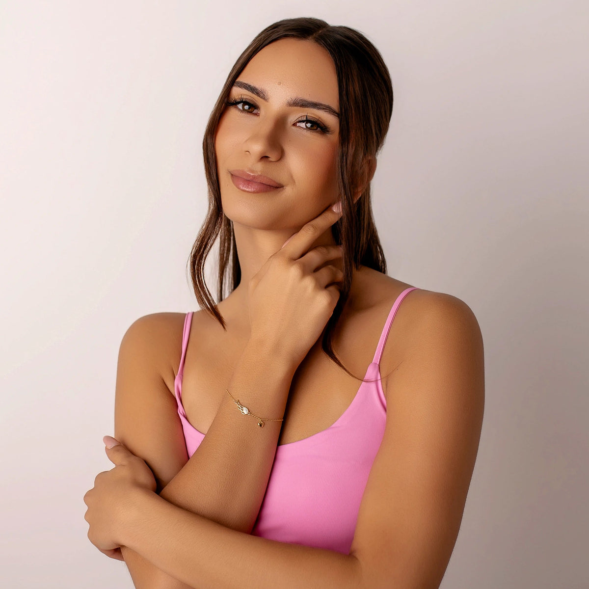 Silberarmband mit Strassflügel und Herz