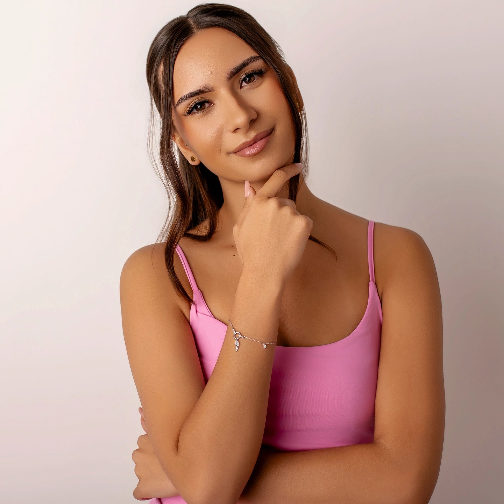 Bracciale Argento con Ala e Punto Luce