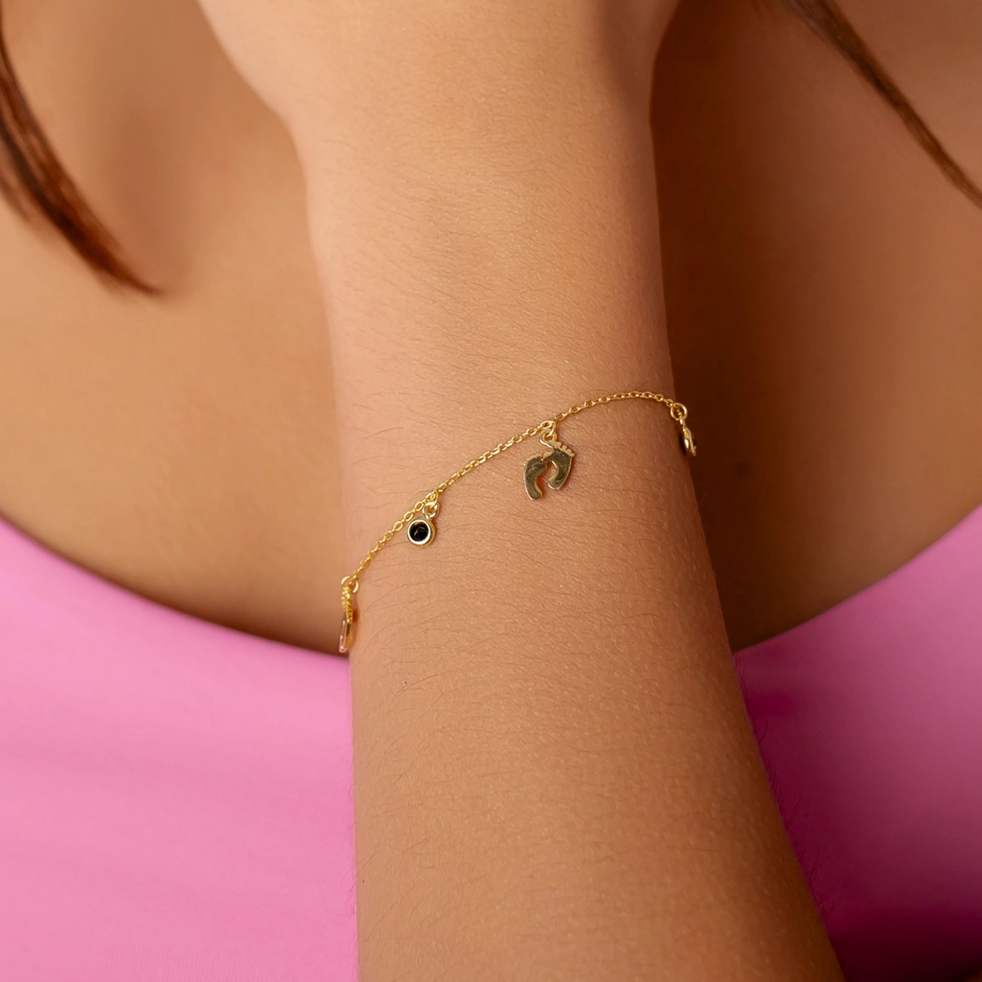 Golden Silver Bracelet with Baby Feet and Sparkling Point