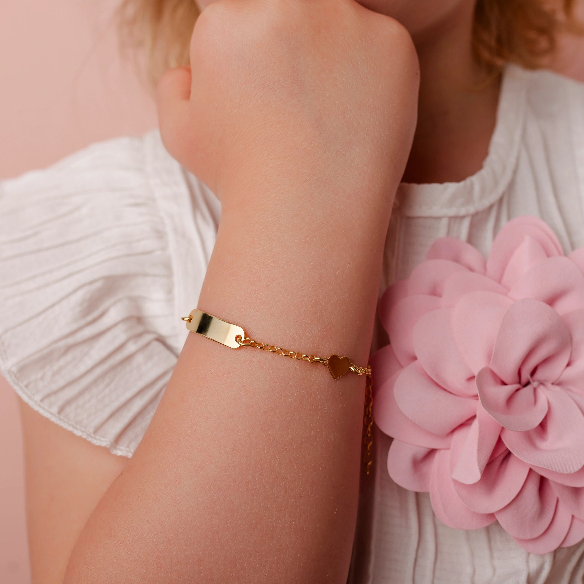 Silberarmband mit Blume und glattem Herz