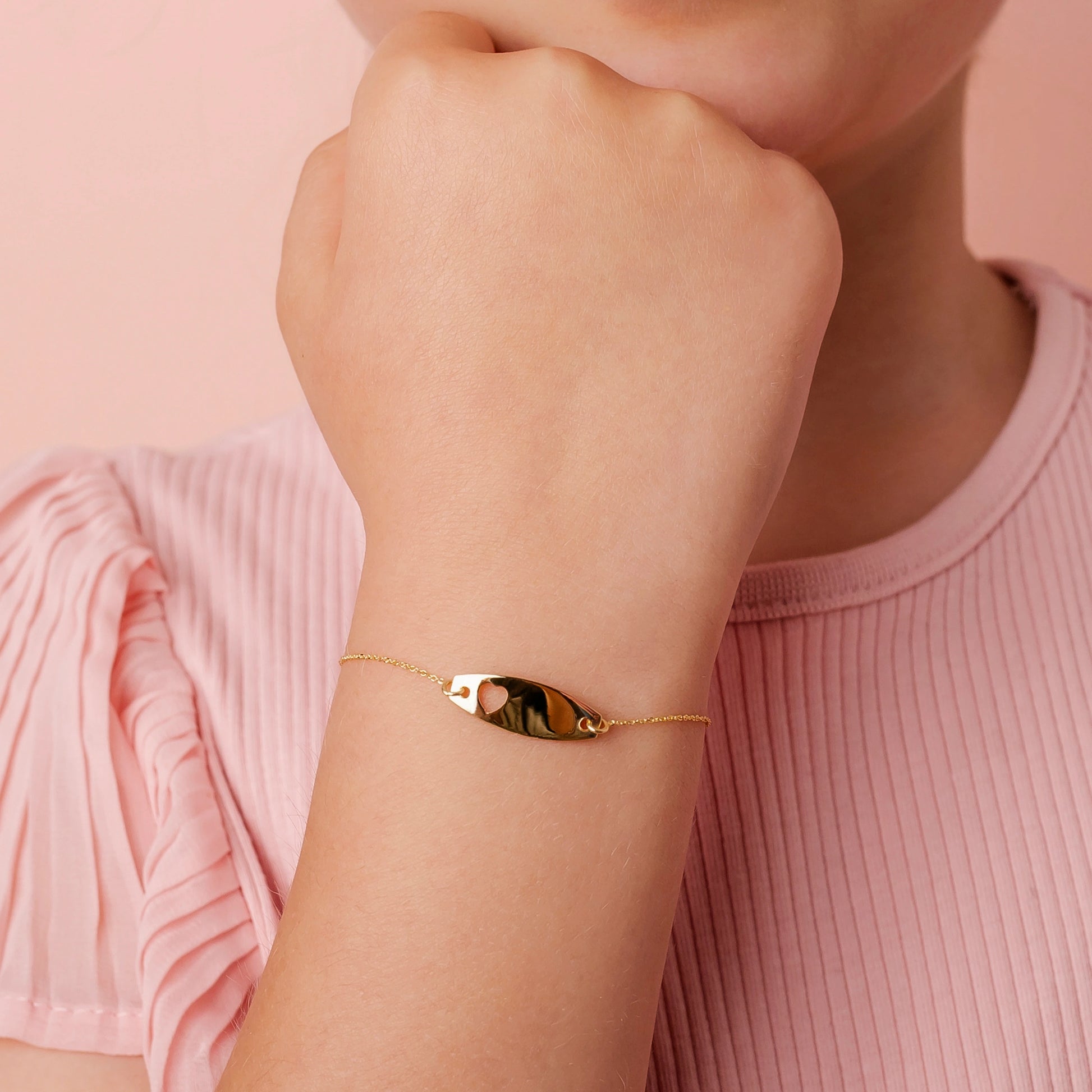 Gold Bracelet with Elliptical Plate and Heart