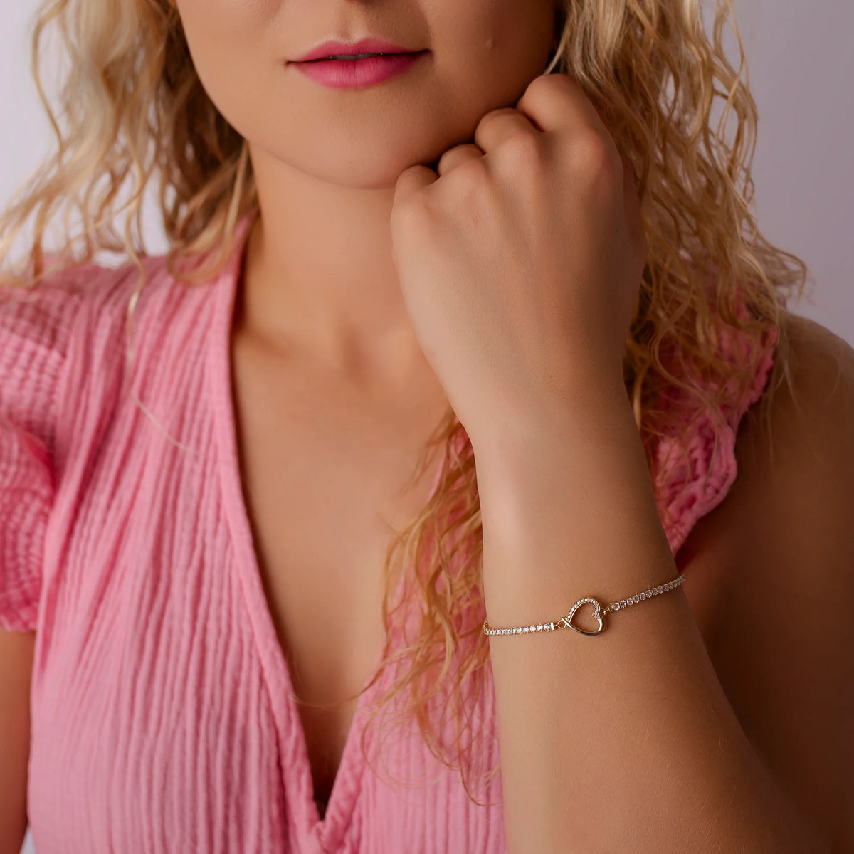 Tennisarmband mit Herz aus 14-karätigem Gold