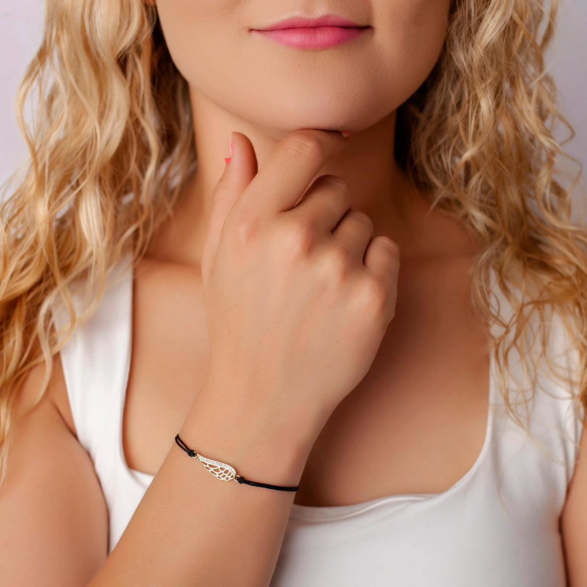 Bracelet en argent avec cordon en forme d'aile et gros strass
