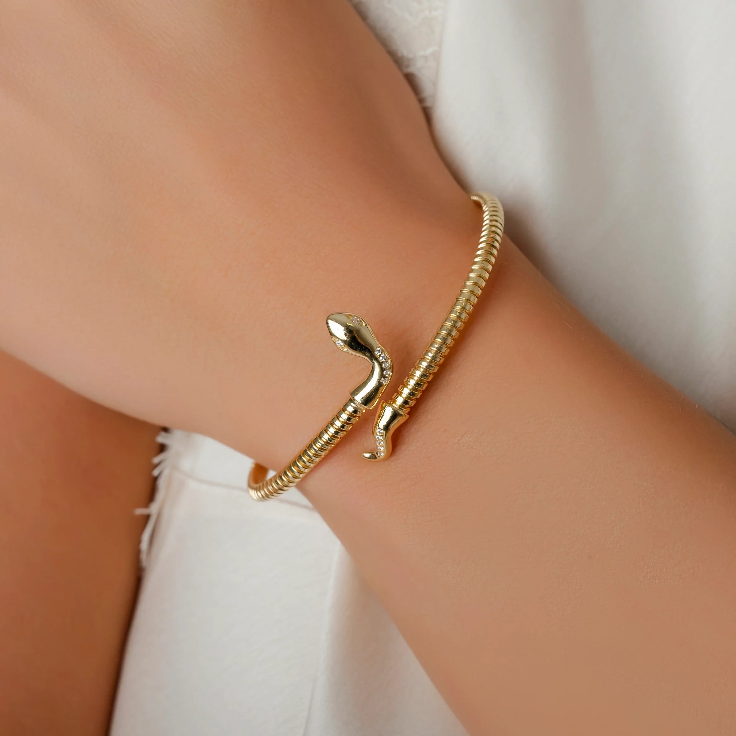 Pulsera rígida plata Poison con circonitas