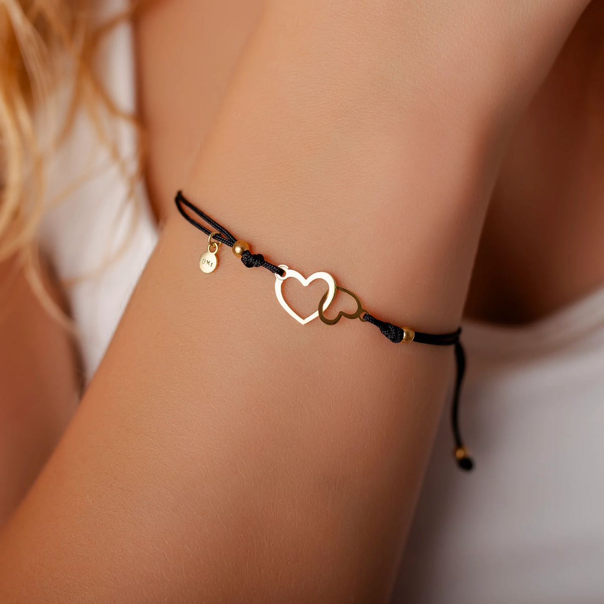 Bracelet cordon en or 9 carats avec double cœur