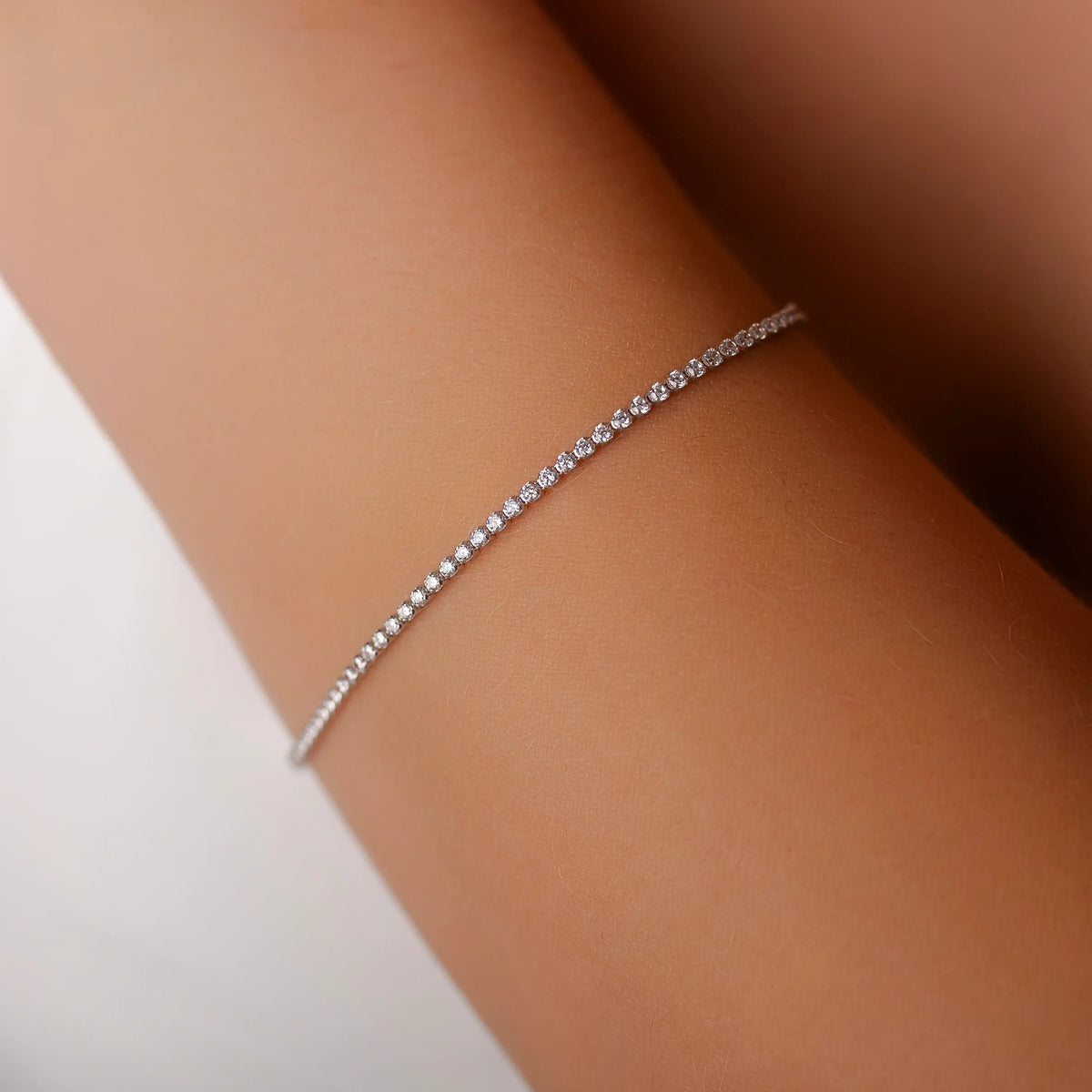 Pulsera Tennis en Oro Blanco 14 KT y Circonios Blancos