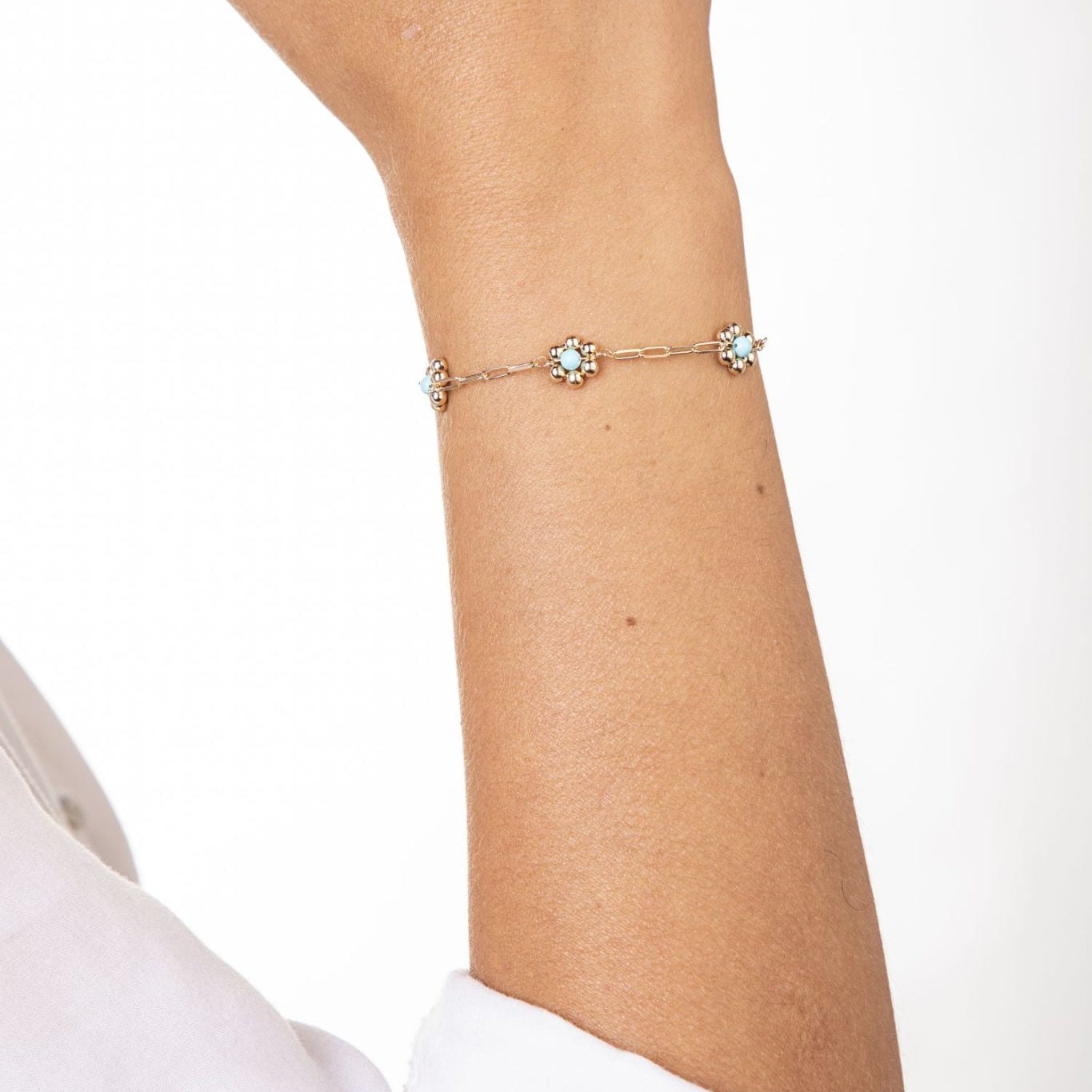 Rechteckiges Armband Goldfarben mit drei türkisfarbenen Blumen