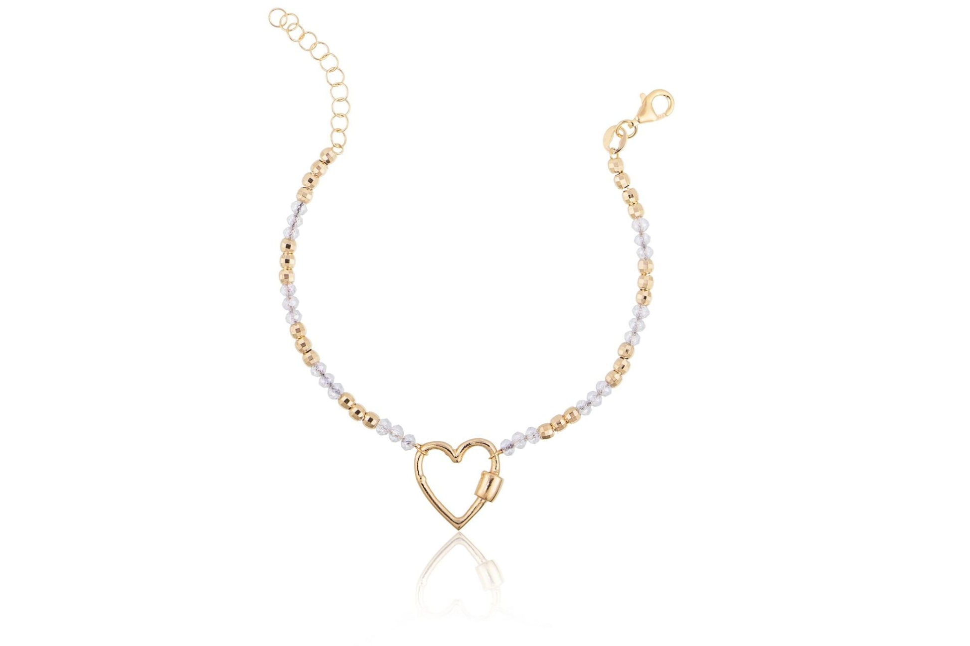 Bracelet doré avec des perles et un cœur ajouré