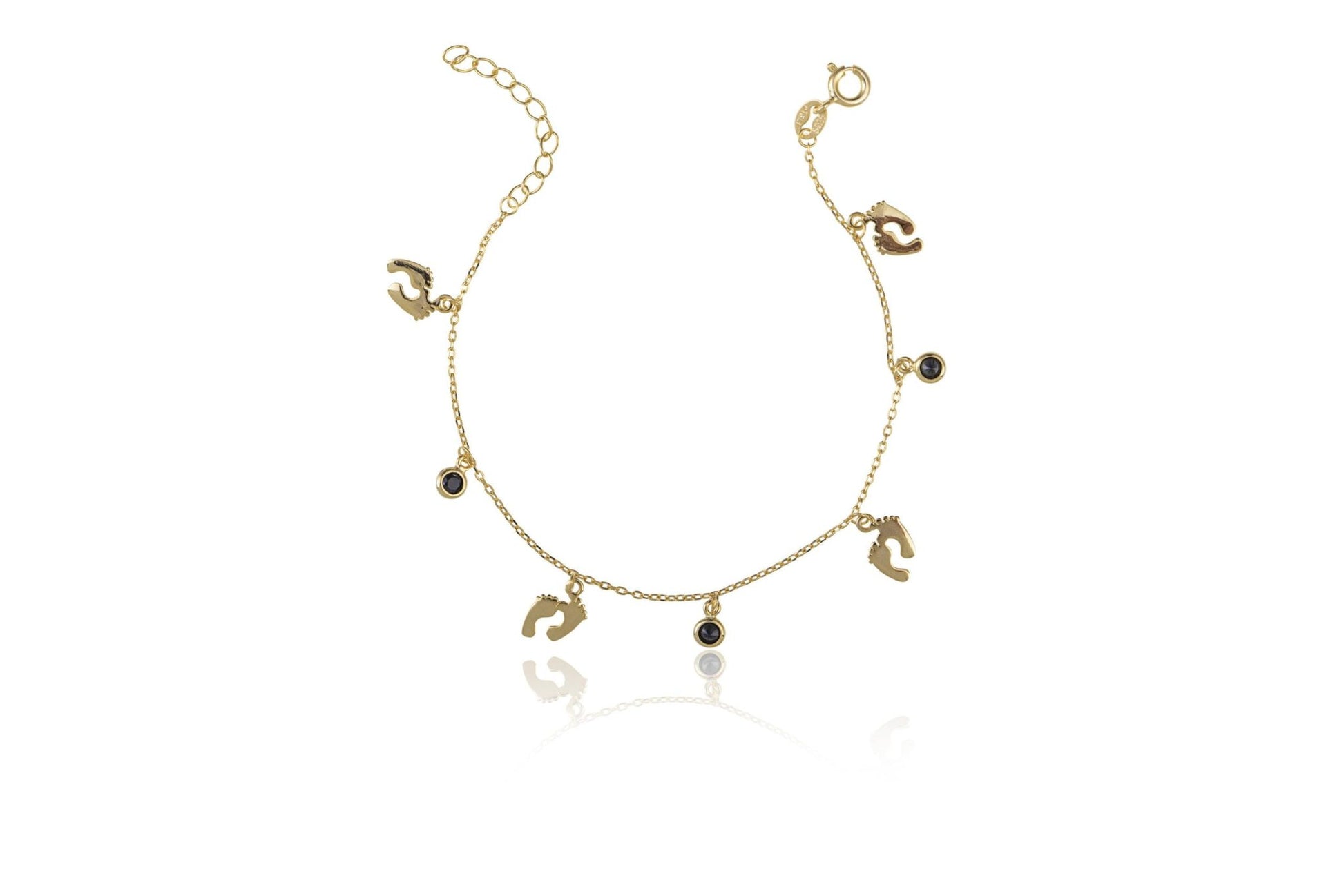 Pulsera de plata dorada con piecitos y punto de luz