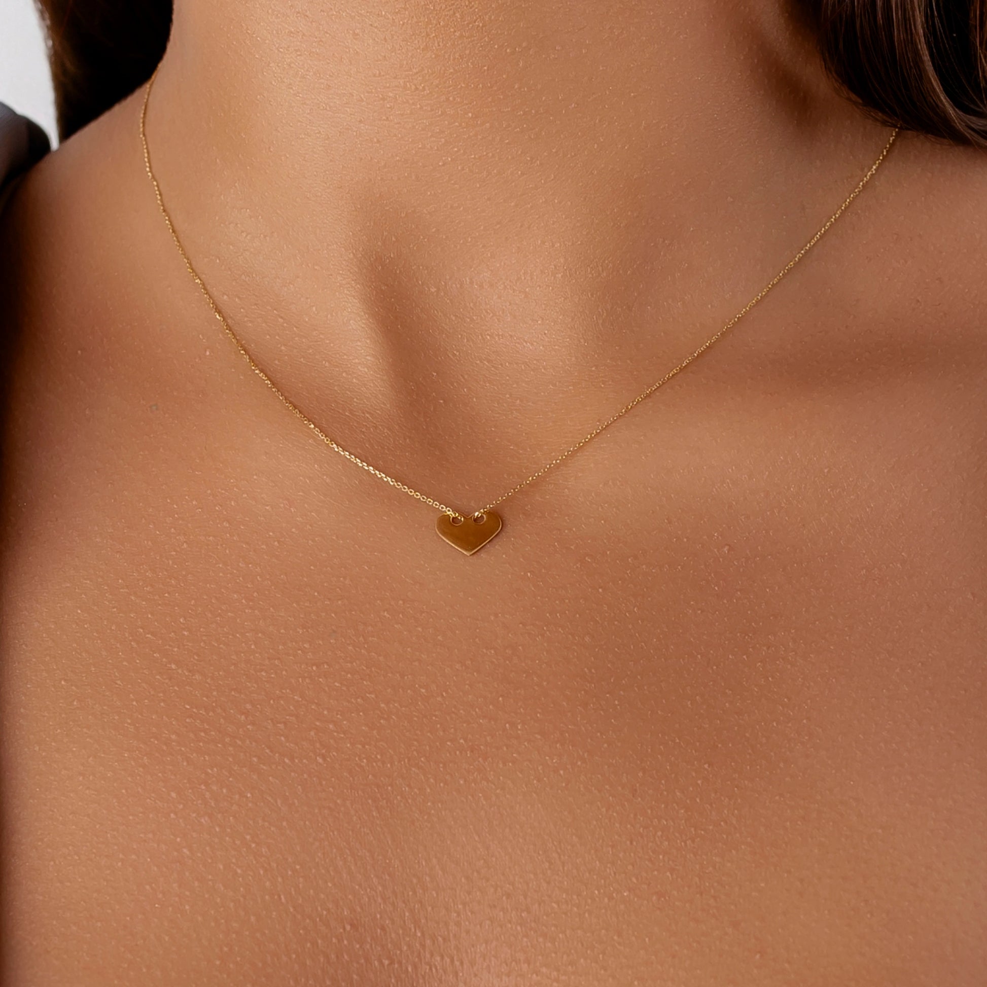 Goldkette mit durchgehendem Herz