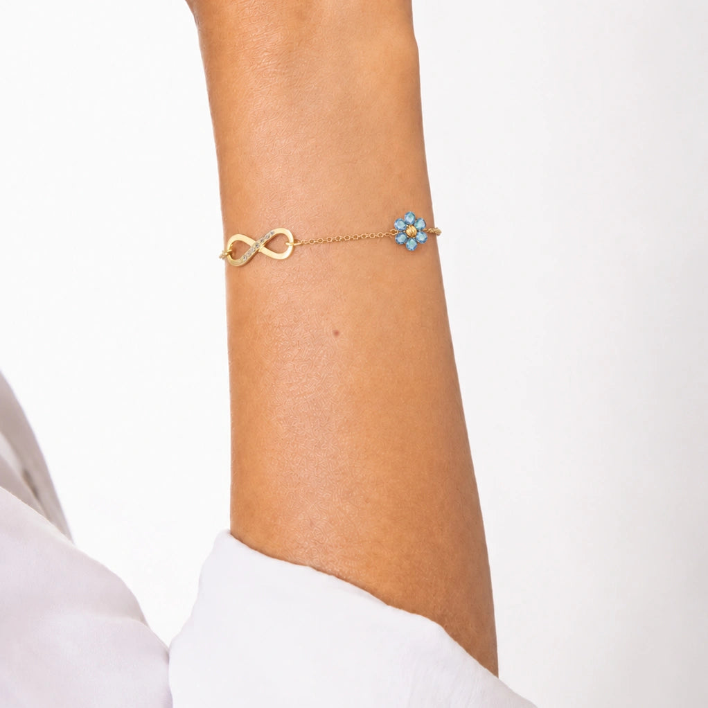 Bracelet doré fleur et infini