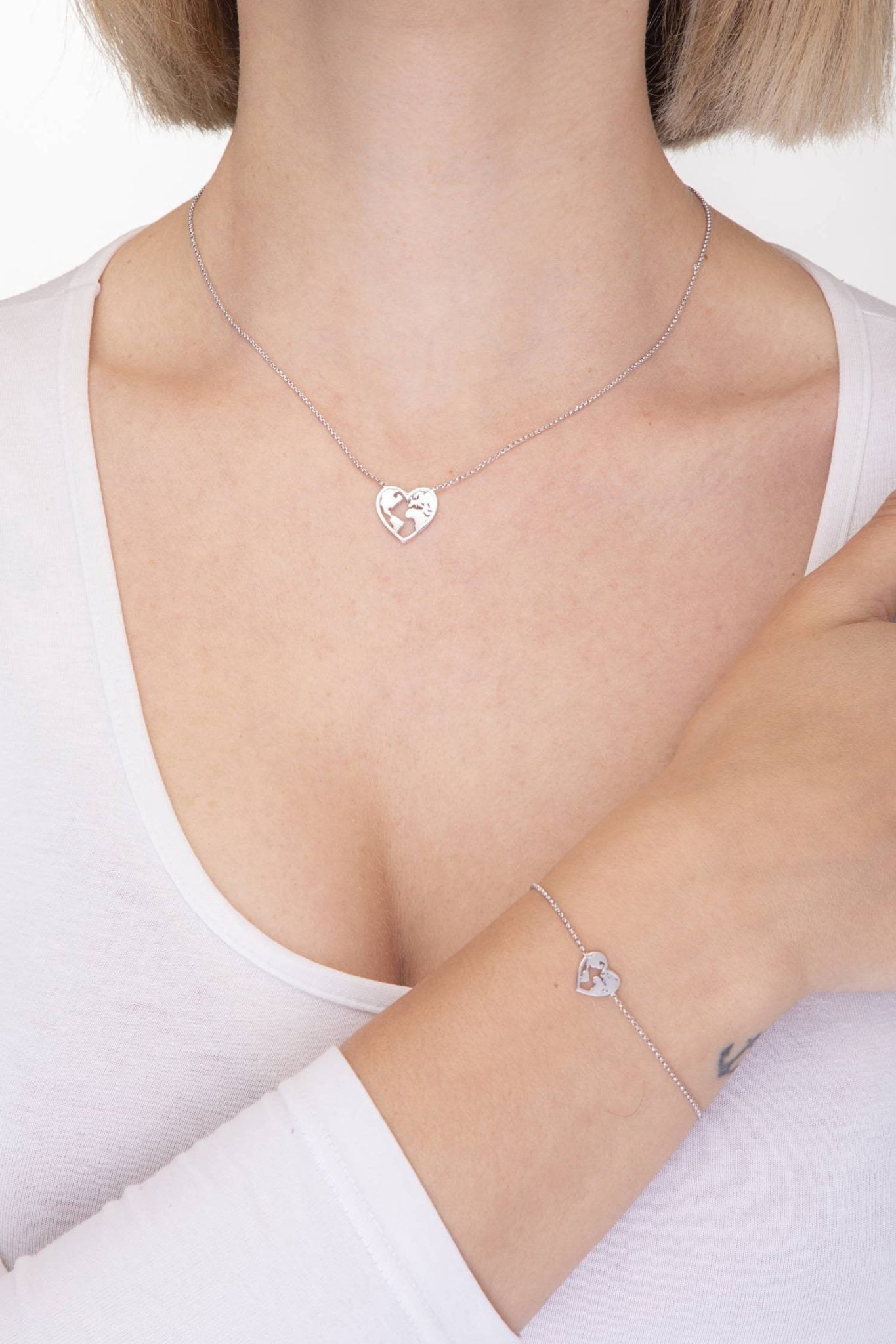 Schmuckset mit Globus im Herz