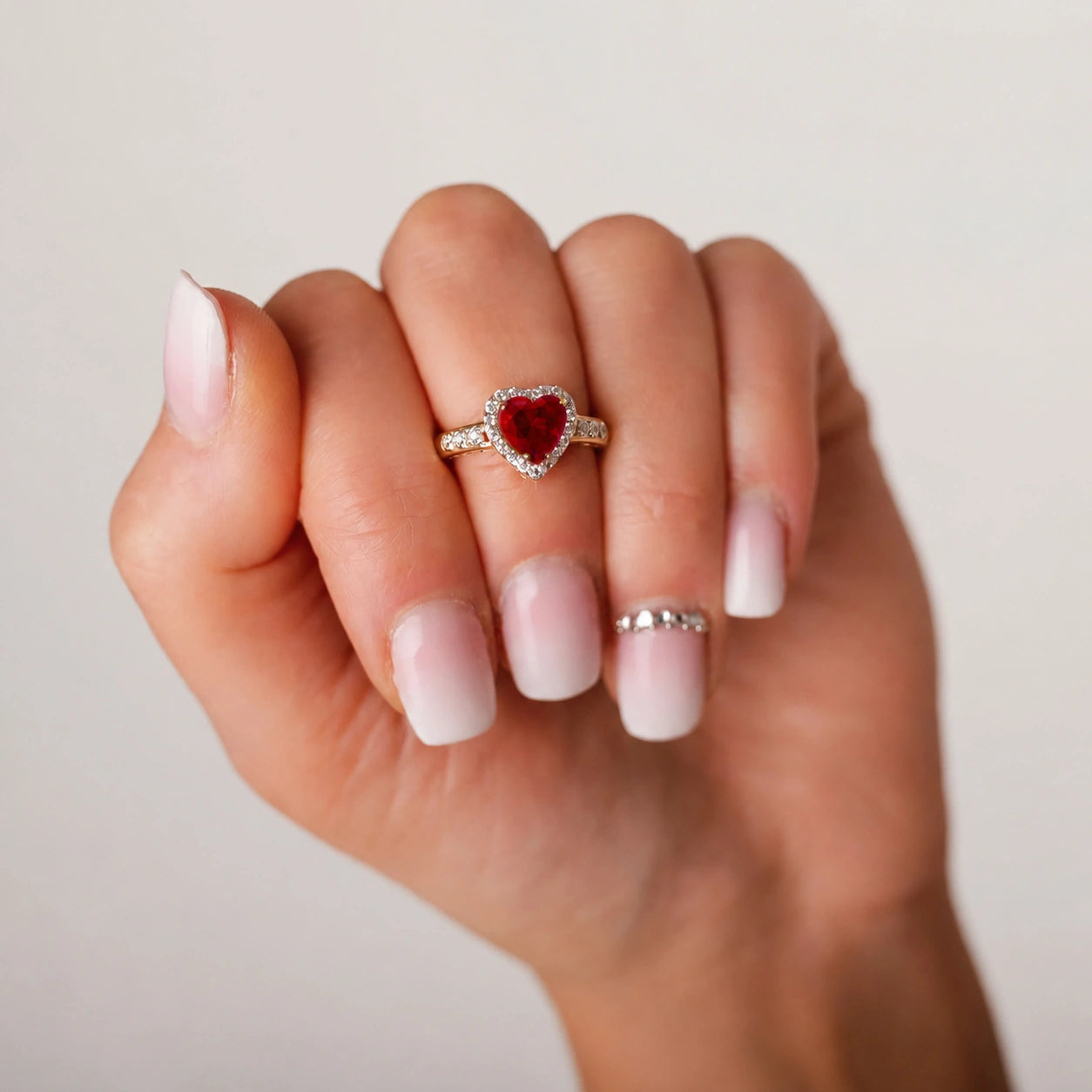 Gold Band Ring with Heart and Red Zirconia