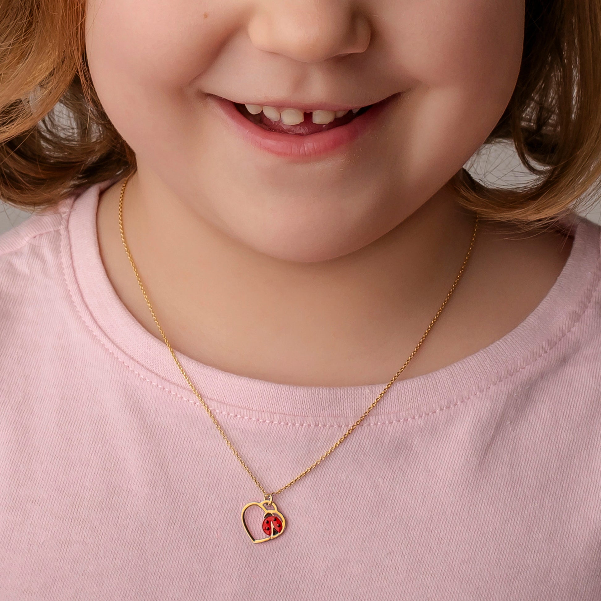 Collana con Cuore e Coccinella Dorata