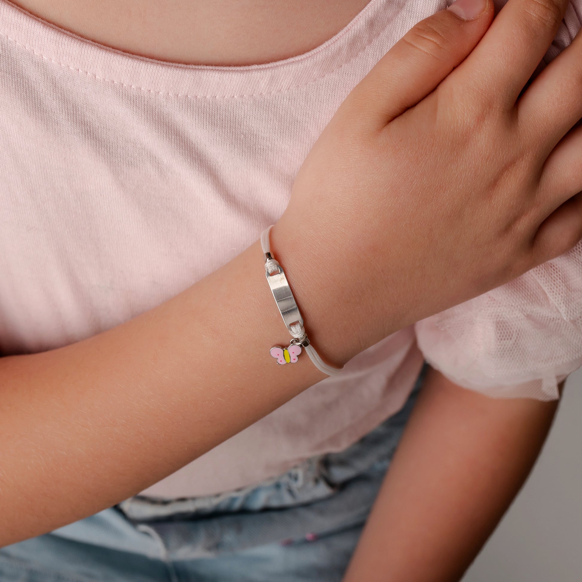 Bracciale Argento Bimba Cordoncino Bianco Farfalla