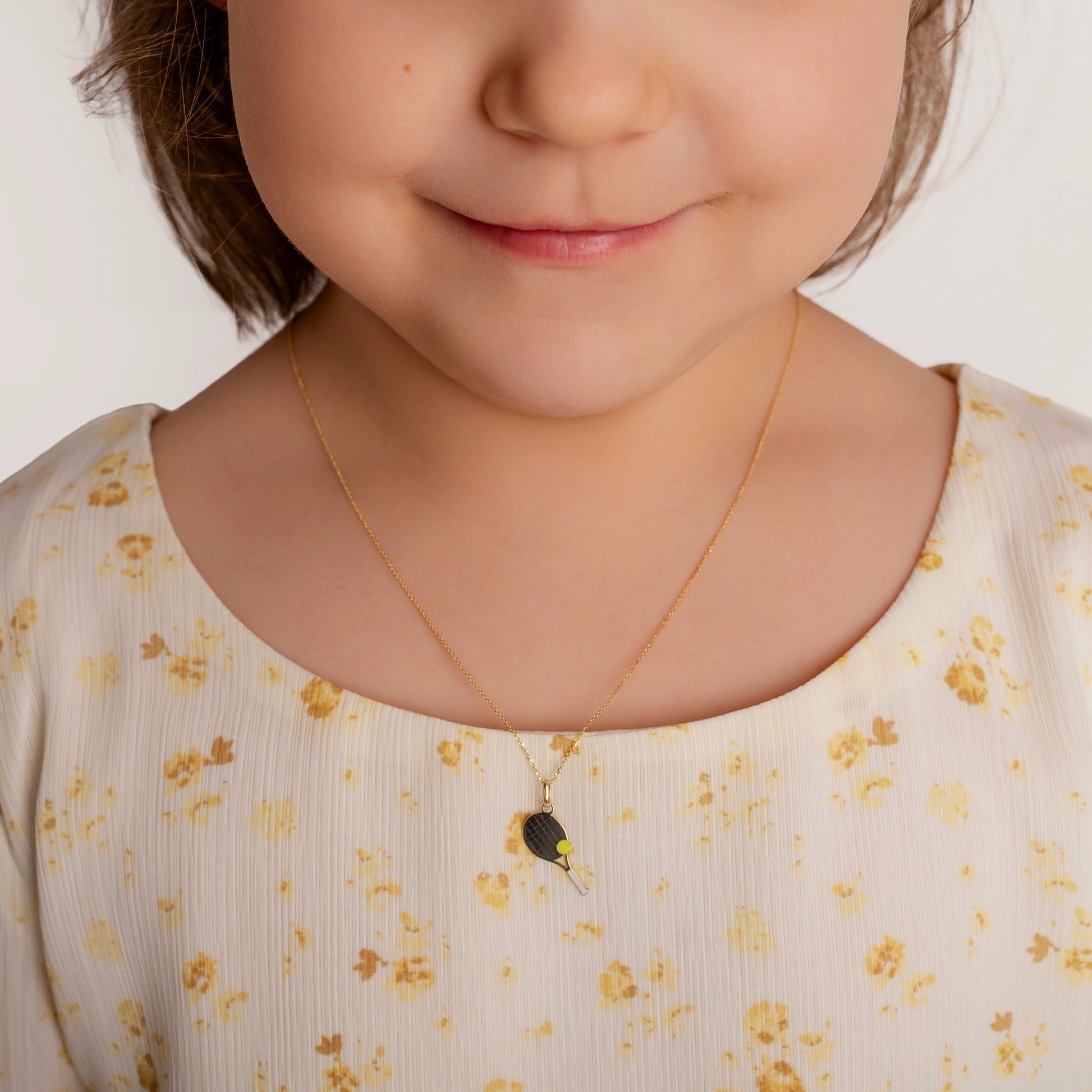 Halskette aus Gold mit Tennis-Schläger-Anhänger