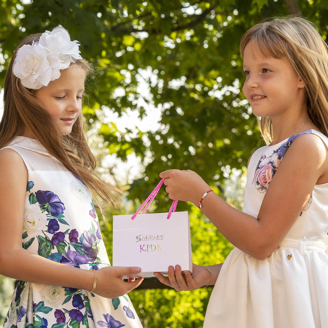 Kinderarmband aus 925er Silber mit personalisierbarer Plakette und Engelanhänger