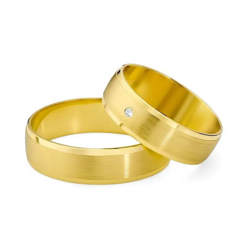 Eheringe aus satiniertem Gelbgold mit Zirkon