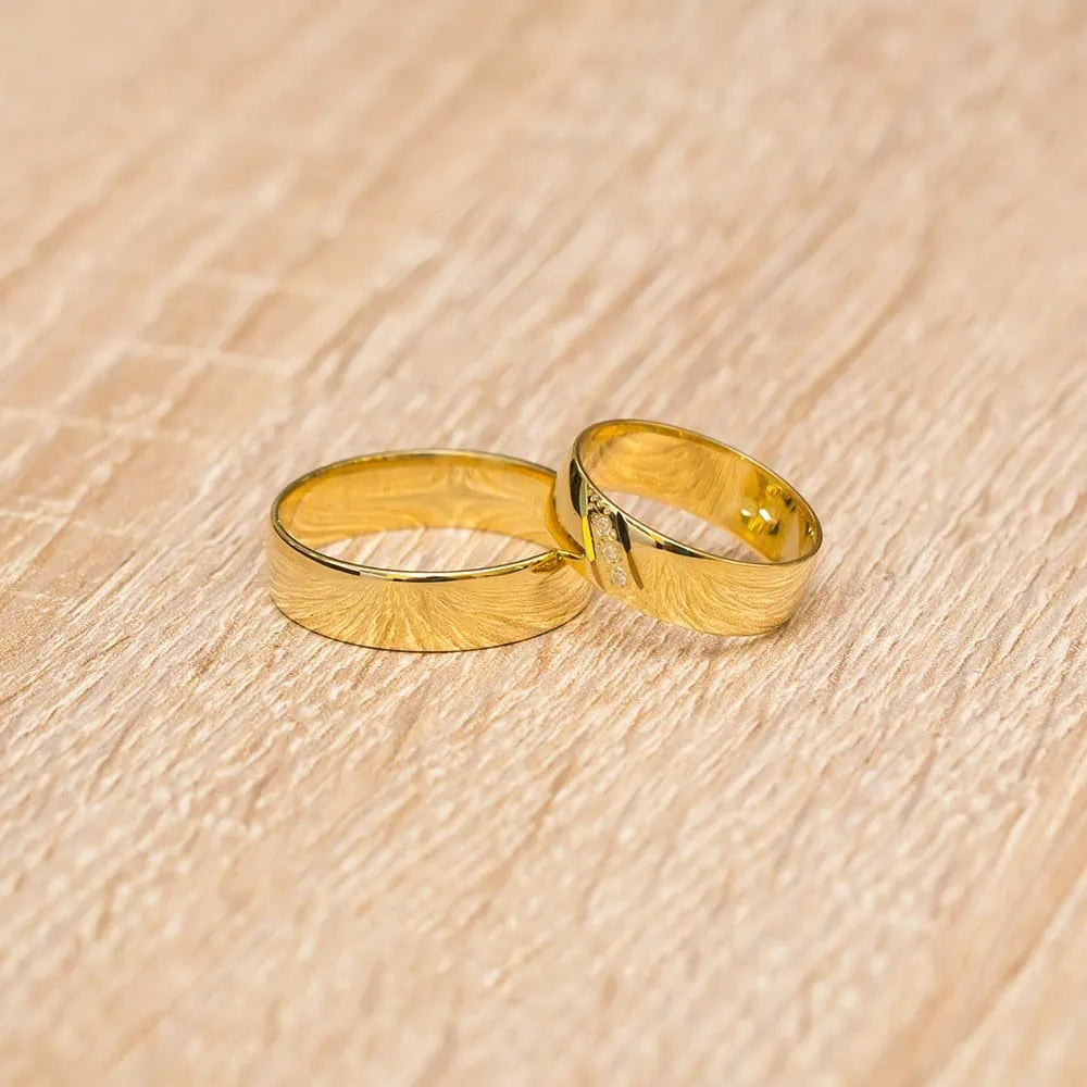Gelbgold Eheringe mit Zirkon