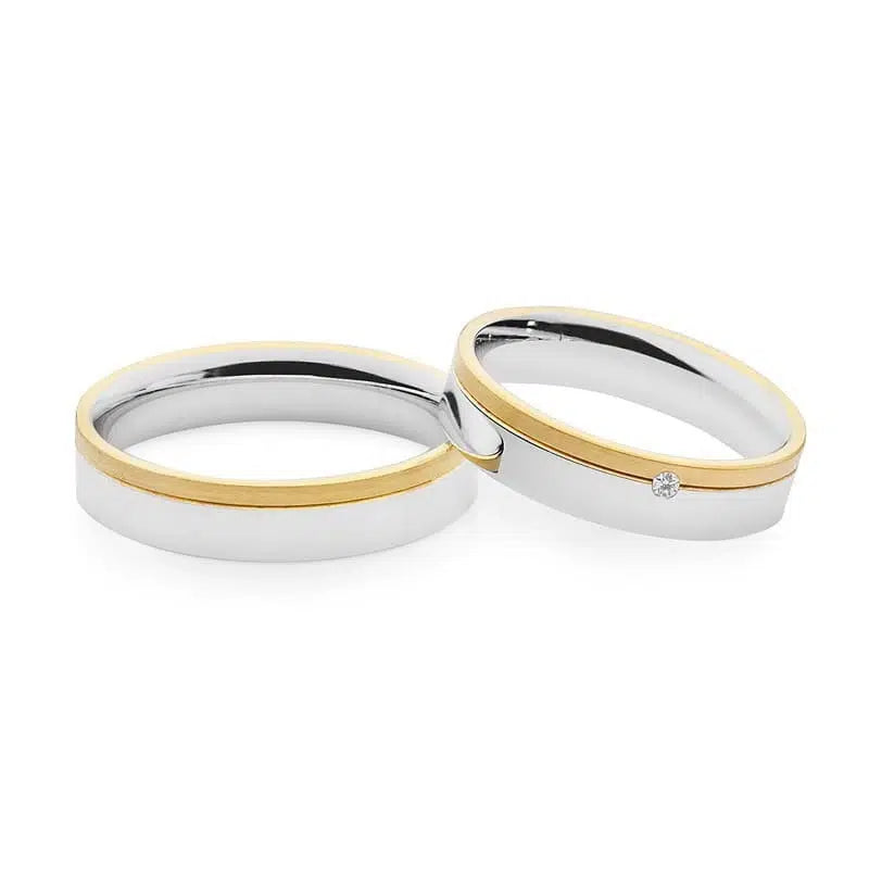 Flache Eheringe aus Gelb- und Weißgold mit Zirkon