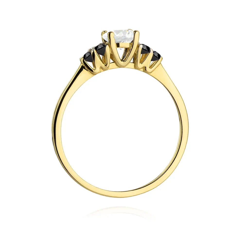 Bague en or jaune avec saphir blanc 0,60 ct et diamants noirs 0,03 ct