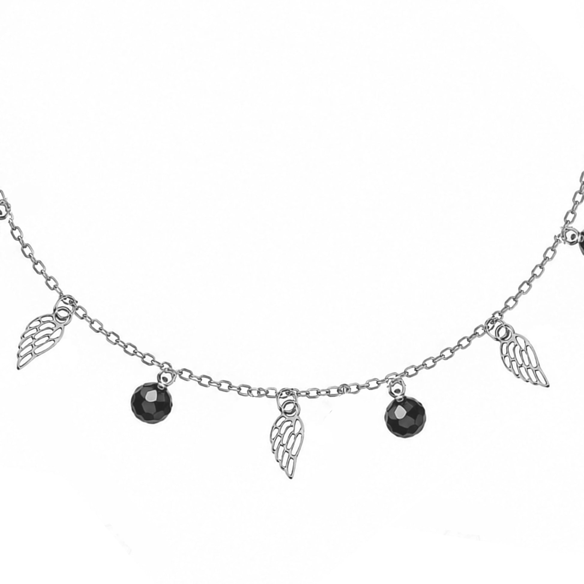 Pulsera de plata rodiada con alas y bolitas negras