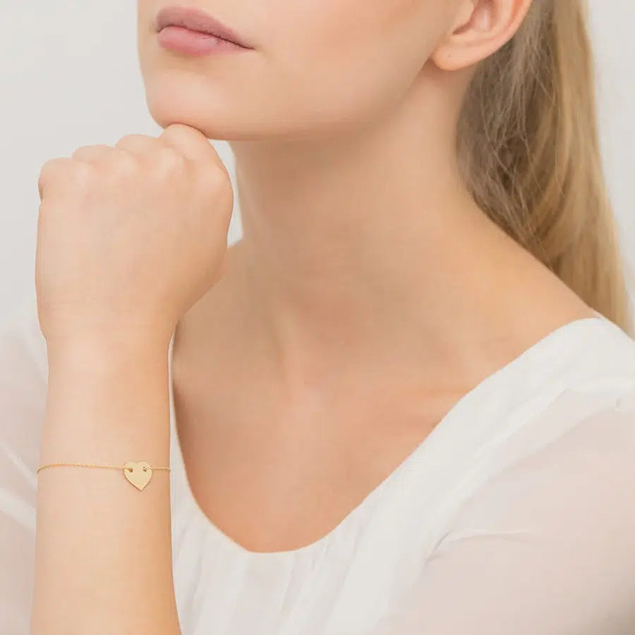 Damenarmband aus goldfarbenem Silber mit durchlaufendem Herz