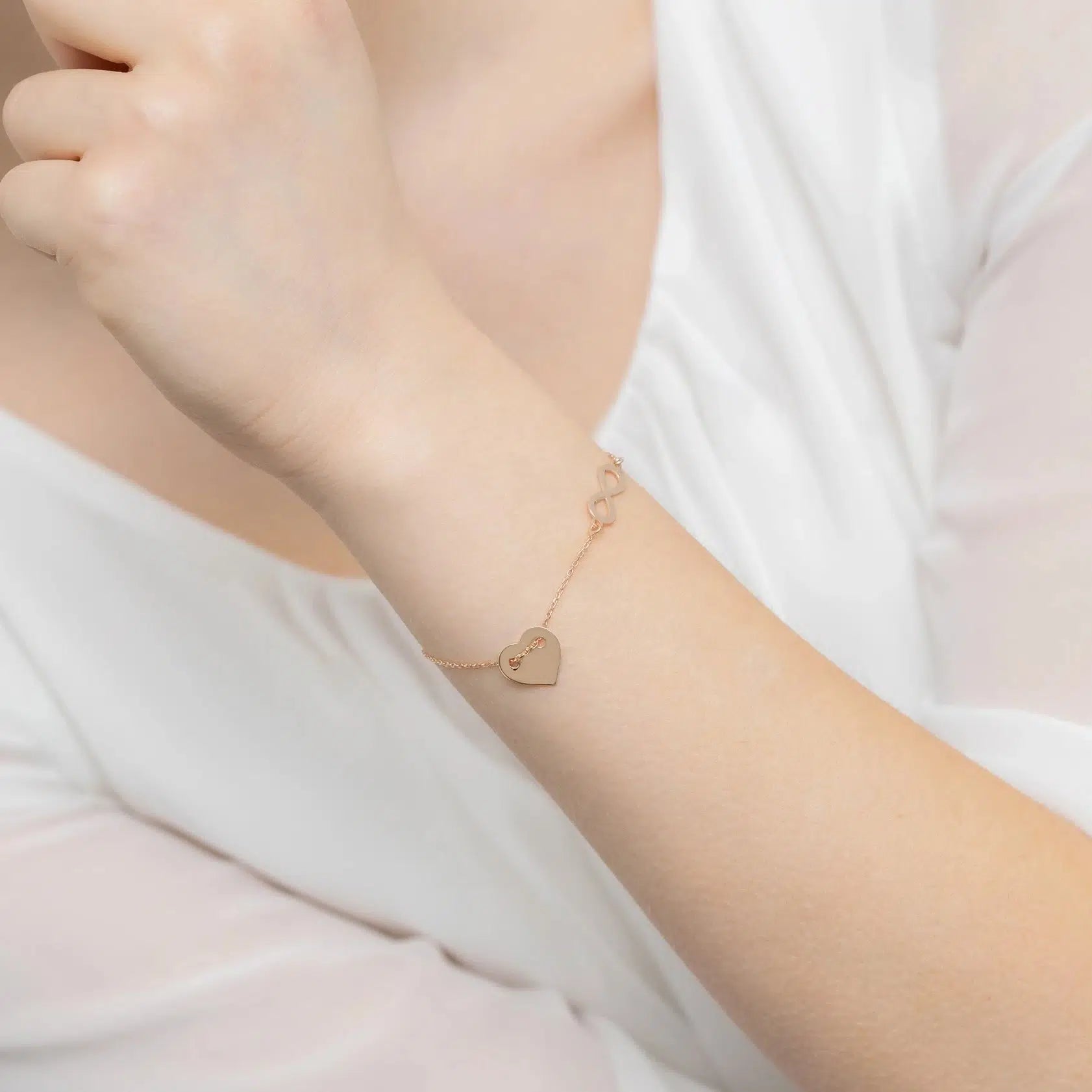 Bracelet en argent pour femme avec cœur coulissant et infini