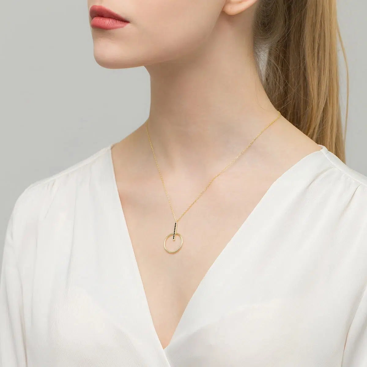 Collana Omega Small Dorata con Zirconi Neri