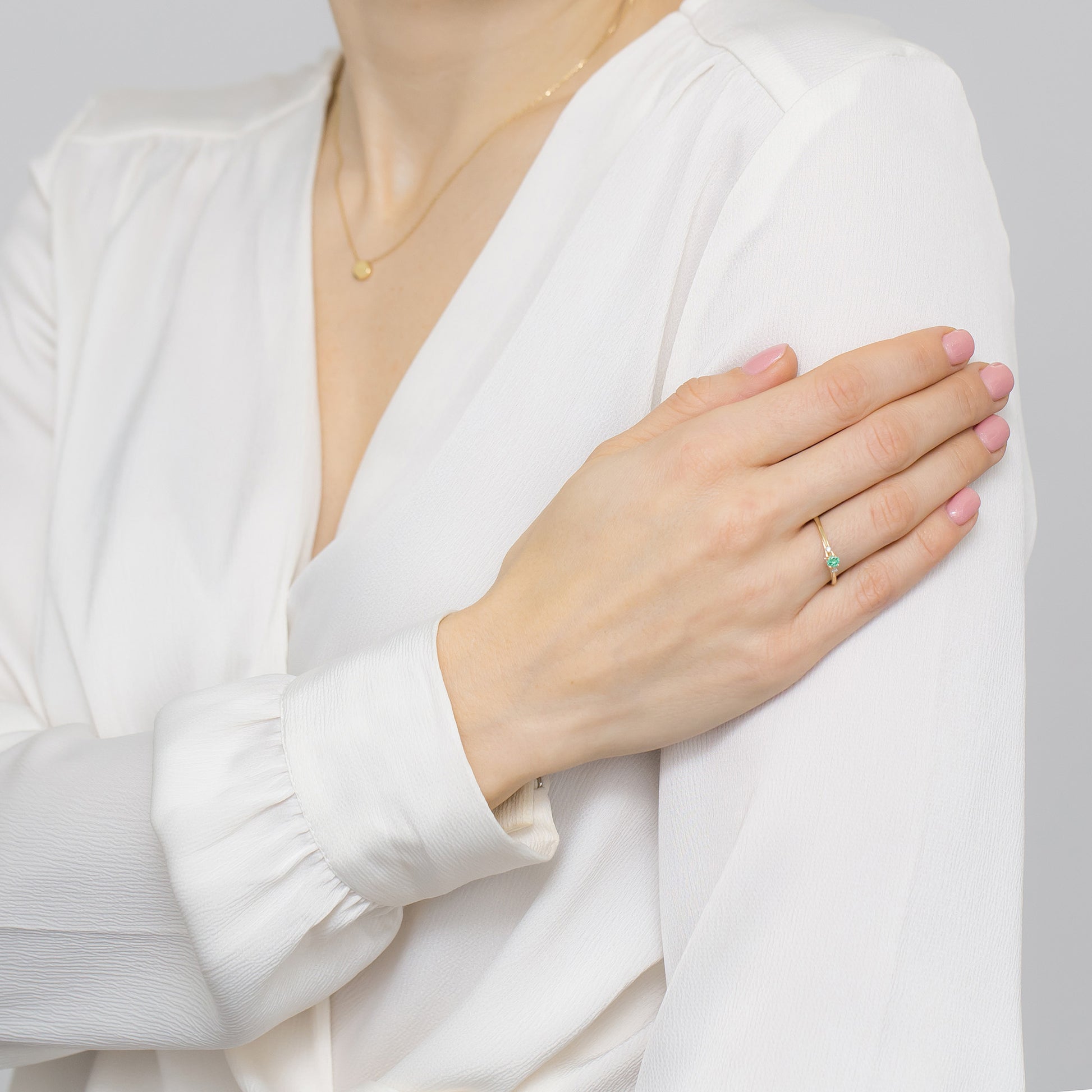 Anello Gaia in Oro con Smeraldo 0,15 ct e 4 Diamanti