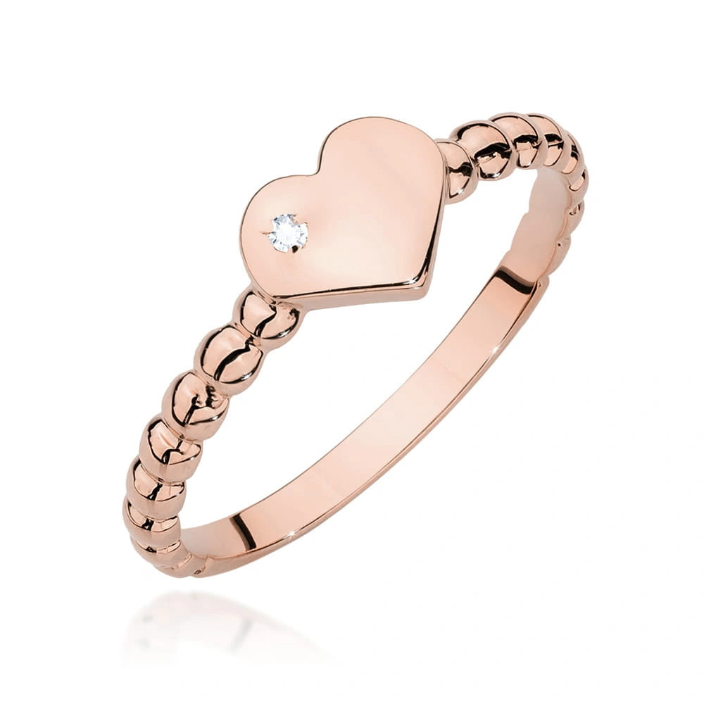 Anillo corazones en oro rosa y diamante