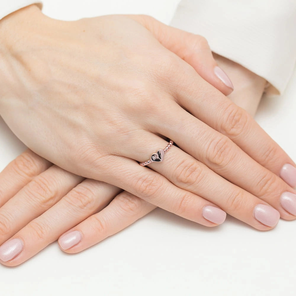 Anillo corazones en oro rosa y diamante