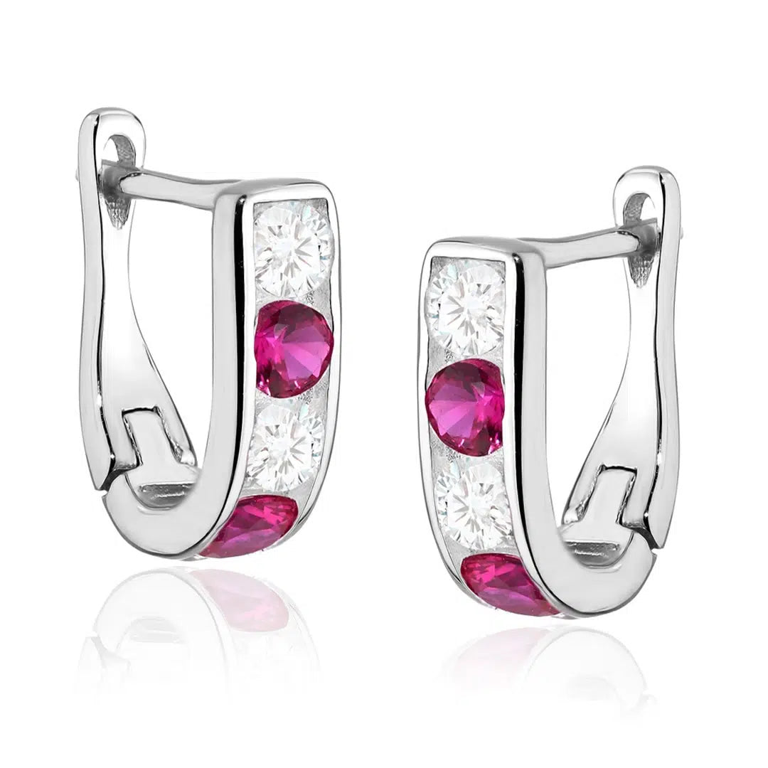 Boucles d'oreilles circulaires avec zircons fuchsia et blancs