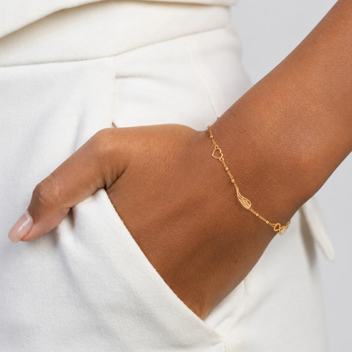 Bracciale con Cuore Infinito e Ala in Oro 14KT